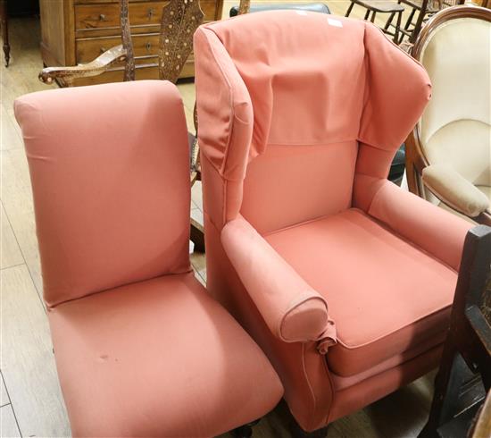A pink upholstered wing armchair and a Victorian nursing chair